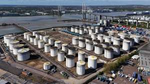 epaselect epa12889044 An image made with a drone shows oil gas and fuel storage units at the Navigator Terminal in Grays, Britain, 14 April 2026. Oil prices have risen above 100 US dollars a barrel again as the US Navy begins a blockade of the Strait of Hormuz following the collapse of ceasefire negotiations between Iran and the United States. Meanwhile, leasing of electric vehicles has surged across Europe amid rising petrol prices linked to the Iran war.  EPA/NEIL HALL