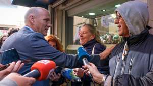 The secretary-general of the Portuguese Communist Party (PCP) Paulo Raimundo (L) speaks with people during a United Democratic Coalition (CDU) campaign, as part of the campaign legislative elections on 10 March, in Setubal, 27 February 2024. On January 15, the President of the Republic decreed the dissolution of parliament and the calling of early legislative elections for March 10, following the resignation of the Prime Minister, Antonio Costa, presented on 07th November 2023, due to Operation Influencer, and immediately accepted by the President of the Republic. RUI MINDERICO/LUSA