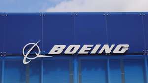 epa11491587 The Boeing logo is pictured on the opening day of the Farnborough International Airshow in Farnborough, Britain, 22 July 2024. The aviation summit is typically a platform for planemakers to rack up multibillion-dollar deals. The airshow runs from 22 to 26 July.  EPA/NEIL HALL