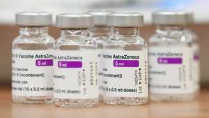 epa09086149 Empty vials of the AstraZeneca Covid-19 vaccine sit on a table at a general practitioner in Ede, the Netherlands, 20 March 2021. EU member countries reintroduced the AstraZeneca Covid-19 vaccine in their inoculation campaigns following the European Medicines Agency (EMA) announcement of 18 March to uphold its approval of the vaccine. Some countries stopped giving the vaccine over fears there might be links between the vaccination against Covid-19 with the AstraZeneca vaccine and a rare number of blood clots.  EPA/Piroschka van de Wouw