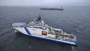 epa11795031 A handout photo dated made available by the Finnish Border Guard on 27 December 2024 shows a border guard vessel and tanker Eagle S off Porkkalanniemi peninsula, Finland, 27 December 2024. Finnish authorities are investigating the Eagle S, an oil tanker registered with the Cook Islands, suspected of having caused the outage of an undersea power cable connecting Finland and Estonia on 25 December.  EPA/HANDOUT HANDOUT EDITORIAL USE ONLY/NO SALES