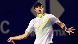 epa10498259 Nuno Borges of Portugal in action against Holger Rune of Denmark during a match of the 2023 Mexican Tennis Open, in the resort of Acapulco, in the state of Guerrero, Mexico, 01 March 2023.  EPA/DAVID GUZMAN