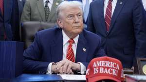 epa12703521 US President Donald Trump (C) looks on as he participates in a bill signing ceremony in the Oval Office of the White House in Washington, DC, USA, 03 February 2026. The bill passed by the House of Representatives restores funding for several major federal departments, ending the partial government shutdown that began on 31 January.  EPA/YURI GRIPAS / POOL