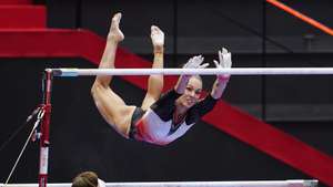 epa09536368 Filipa Martins of Portugal fails to grab the bar as she performs the uneven bars during the Women's All-Around Final at the 50th FIG Artistic Gymnastics World Championships in​ Kitakyushu, Japan, 21 October 2021.  EPA/KIMIMASA MAYAMA