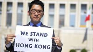 epa08624389 Exiled Hong Kong student activist Nathan Law, attends a protest outside Italian Ministry of Foreign Affairs asking to be received by Foreign Minister Luigi Di Maio, ahead of a bilateral meeting with his counterpart from the People&#039;s Republic of China Wang Yi later in the day, in Rome, Italy, 25 August 2020.  Nathan Law is one of Hong Kong&#039;s democracy activists, now in exile and one of six wanted abroad for alleged violation of the new National Security Law imposed by the Beijing regime, on the population of Hong Kong.  EPA/RICCARDO ANTIMIANI