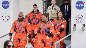 epaselect epa12865179 (L-R) Pilot Victor Glover of NASA, Mission Specialist Jeremy Hansen of the Canadian Space Agency, Commander Reid Wiseman of NASA and Mission Specialist Christina Koch of NASA walk out of the Neil A. Armstrong Operations and Checkout Building toward Launch Pad 39B as part of Artemis II’s launch preparations in Titusville, Florida, USA, 01 April 2026. Artemis II is scheduled to launch 01 April 2026 on a crewed lunar flyby, the first human mission beyond low Earth orbit since 1972.  EPA/CRISTOBAL HERRERA-ULASHKEVICH