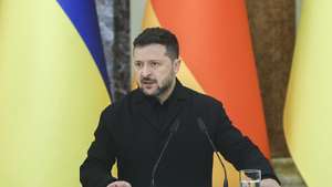 epa13280794 Ukraine's President Volodymyr Zelensky speaks during a joint press conference with Germany's Chancellor Friedrich Merz (not pictured) at the Mariinskyi Palace in Kyiv, Ukraine, 04 October 2026. Friedrich Merz arrived in Kyiv to meet with top Ukrainian officials amid the ongoing Russian invasion.  EPA/SERGEY DOLZHENKO