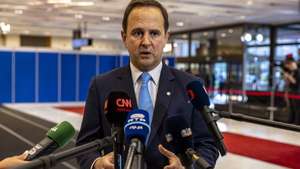 epa10172506 Portugal's Finance Minister Fernando Medina talks to the media as he arrives for the European Economic and Financial Affairs Ministerial Meeting in Prague, Czech Republic, 09 September 2022.  EPA/MARTIN DIVISEK
