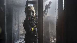 epa13027224 Ukrainian rescuers work at the site of a Russian drone strike on a residential building in Kharkiv, northeastern Ukraine,
09 June 2026. Four shock drones hit Kharkiv during a daytime attack, injuring at least two people, according to Oleg Synegubov, head of the Kharkiv Military Administration.  EPA/SERGEY KOZLOV