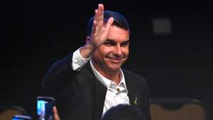 epa13152069 Brazilian presidential candidate Flavio Bolsonaro reacts during a Liberal Party ceremony in Brasilia, Brazil, 05 August 2026. Bolsonaro announced that Congressman Alfredo Gaspar, a former prosecutor from the country's impoverished northeast, will be his running mate for the October elections.  EPA/Andre Borges