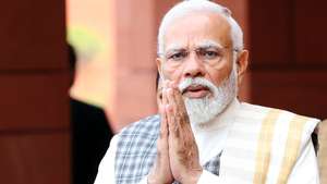 epa11010305 Indian Prime Minister Narendra Modi talks to the media upon his arrival with other cabinet ministers to attend the winter session at the new Parliament House building in New Delhi, India, 04 December 2023. Modi said that Parliament, the temple of democracy, is a very important platform for people's aspirations and to strengthen the foundation of developed India. Nineteen bills and two financial items to be taken up in the session, according to Parliamentary Affairs Minister Pralhad Joshi.  EPA/HARISH TYAGI