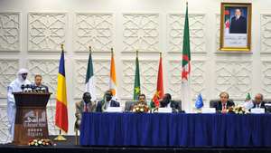 epa04747973 Malian Secretary General of the Coordination of the Movements of Azawad (CMA) group, Bilal Agh Cherif (L), speaks before a signing ceremony for a peace agreement between the Malian government and armed groups, in Algiers, Algeria, 14 May 2015. The CMA, a rebel umbrella group comprises three factions seeking secession for the north of Mali, was one of the groups that have taken part in peace talks in Algeria over the past 10 months. The peace plan has been initialed by the government and its allies, but the CMA has already missed two deadlines for signing - March 1 and April 15.  EPA/STR