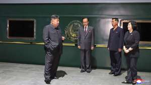 epa12344642 A photo released by the official North Korean Central News Agency (KCNA) shows North Korean leader Kim Jong Un (L) standing by his private train before departing for Beijing in Pyongyang, North Korea, 01 September 2025 (issued 02 September 2025). The North Korean leader departed on 01 September on his private train to Beijing to attend celebrations marking the 80th anniversary of the victory of the Chinese People’s War of Resistance Against Japanese Aggression and the World Anti-Fascist War, according to Kim Chon Il, director of the DPRK Foreign Ministry’s Department of Press and Information.  EPA/KCNA  EDITORIAL USE ONLY