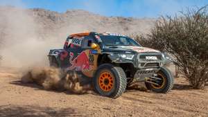 epa11805980 American driver Seth Quintero and German co-driver Dennis Zenz drive their Toyota GR DKR Hilux for Toyota Gazoo Racing during the first stage of the 2025 Dakar Rally, in Bisha, Saudi Arabia, 04 January 2025.  EPA/Coen Schluter