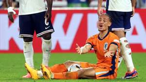epa11471300 Xavi Simmons of the Netherlands reacts on the pitch after being fouled during the UEFA EURO 2024 semi-finals soccer match between Netherlands and England, in Dortmund, Germany, 10 July 2024.  EPA/FRIEDEMANN VOGEL