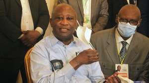 epa09281392 Former Ivorian president Laurent Gbagbo gestures as he speaks to supporters at the Ivorian Popular Front (FPI) offices in Abidjan, Ivory Coast, 17 June 2021. Former president Gbagbo returns from his exile in Brussels after ICC appeals judges on 31 March 2021 upheld the acquittals of Gbagbo and Goude who were both in 2019 acquitted from the charges of war crimes allegedly committed during post-electoral violence in Ivory Coast between December 2010 and April 2011.  EPA/LEGNAN KOULA