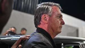 epa11740683 Brazil's former President Jair Bolsonaro leaves Juscelino Kubitschek International Airport after giving a press conference, in Brasilia, Brazil, 25 November 2024.  EPA/Andre Borges