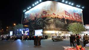 epa13193395 Iranians take part in a night demonstration against the United States near an anti-US billboard in Tehran, Iran, 26 August 2026, following Washington's announcement of new sanctions. Tehran promised to retaliate after US Treasury Secretary Scott Bessent, acting at President Donald Trump's direction, launched 'Operation Economic Outcast,' an economic campaign designed to cut off Iran's global financial connections.  EPA/ABEDIN TAHERKENAREH RESTRICTIONS: NO Access Israel Media/Persian Language TV Stations Outside Iran/Strictly No Access BBC Persian/VOA Persian/Manoto TV/Iran International TV. (As mandated by Iran's Directorate General for Foreign Media) --