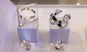 epa12422138 Silver creations of French designer Sabrina Guerrera are seen at her stand of the main exhibition during the Romanian Jewelry Week 2025, held at the National Library building in Bucharest, Romania, 01 October 2025. Bucharest hosts the 6th edition of Romanian Jewelry Week from 01 to 05 October 2025, showcasing 270 designers from 40 countries. Organized by Assamblage since 2020, it’s Romania’s largest contemporary jewelry event, featuring exhibitions, fairs, workshops, and the RJW Awards judged by an international jury.  EPA/ROBERT GHEMENT
