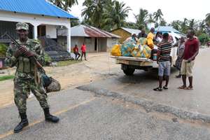 epa09131124 Residents try to return to normality in Palma, Cabo Delgado, Mozambique, 12 April 2021. The violence unleashed more than three years ago in Cabo Delgado province escalated again about two weeks ago, when armed groups first attacked the town of Palma.  EPA/JOAO RELVAS