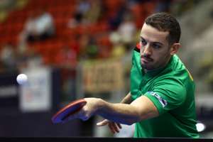 epa11666449 Marcos Freitas of Portugal in action during his Men’s Singles round of 32 match against Tomislav Pucar of Croatia at the Table Tennis European Championships in Linz, Austria, 18 October 2024.  EPA/ANNA SZILAGYI