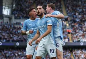 epa13252001 Rayan Cherki of Manchester City (C) celebrates scoring the 2-1 goal with Enzo Fernandez of Manchester City (L) and Elliot Anderson of Manchester City (R) during the English Premier League match between Manchester City and Sunderland AFC, Manchester, Britain, 20 September 2026.  EPA/ADAM VAUGHAN EDITORIAL USE ONLY. No use with unauthorized audio, video, data, fixture lists, club/league logos, 'live' services or NFTs. Online in-match use limited to 120 images, no video emulation. No use in betting, games or single club/league/player publications.