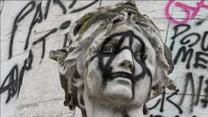 Graffiti on the monument in Place de la République in Paris.