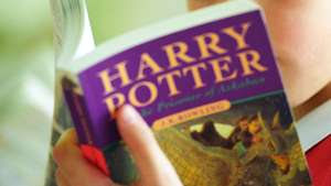 Boy Reading Harry Potter