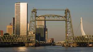Early morning sunshine on the River Maas and de Hef railway bridge, Koningshaven