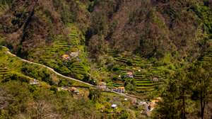 A valley with houses and terraced fields in the interior of