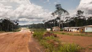 Huts and homes for construction workers building the new capital city which can be seen being built in Oyala, Equatorial Guinea, Africa