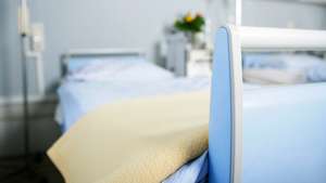 An empty hospital bed