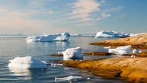 Icebergs from the Jacobshavn glacier or Sermeq Kujalleq drains 7% of the Greenland ice sheet and is the largest glacier outside of Antarctica. It calves enough ice in one day to supply New York with water for one year. It is one of the fastest moving glac