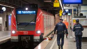 Man pushed in front of suburban train