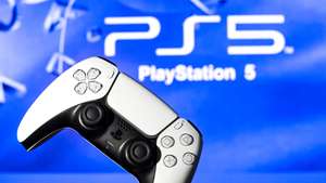 In this photo illustration, a PlayStation 5 controller seen