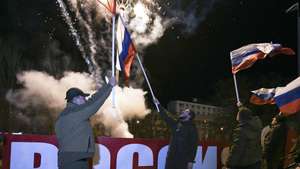 Donetsk residents celebrate signing decrees recognizing independence of Donetsk and Lugansk People's Republics
