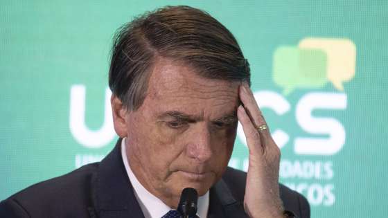 epa10147732 Jair Bolsonaro, current president of Brazil and candidate of the Liberal Party (PL), participates in the debate 'Dialogue with Presidential candidates of the Republic', promoted by the National Union of Entities of Trade and Services (UNECS), in Brasilia, Brazil, 30 August 2022. The elections in Brazil will be held next 02 October and if no candidate obtains 50 percent of the valid votes, a second round will be held on 30 October 2022.  EPA/Joedson Alves