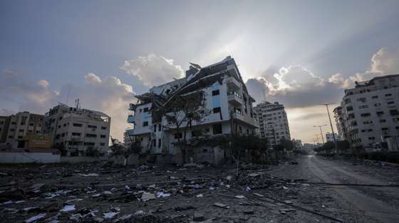 epa10918252 An area with heavily damaged and destroyed buildings is deserted after residents of Gaza City began to evacuate following an Israeli warning of increased military operations in the Gaza strip, 14 October 2023. The Israeli Defense Force (IDF) on 13 October had called for the evacuation of all civilians of northern Gaza ahead of an expected ground invasion.  EPA/MOHAMMED SABER
