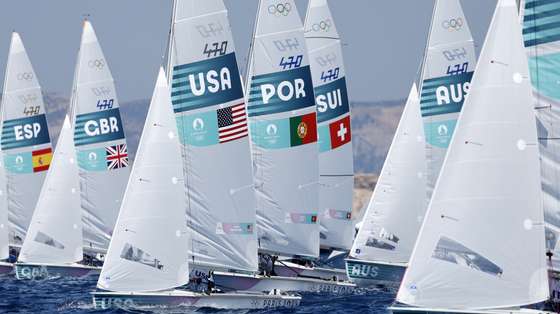 epa11530692 Skippers from different country in action during the Mixed Dinghy 470 opening series race of the Sailing competitions in the Paris 2024 Olympic Games, in Marseille, France, 06 August 2024.  EPA/SEBASTIEN NOGIER
