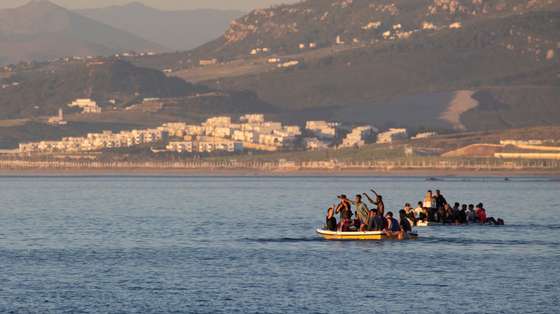 epa09211867 Two small boats with migrants leaving Morocco head towards the Spanish city of Ceuta, located in northern Africa, 19 May 2021. Spain's Government considers that the massive arrival of some 8,000 irregular migrants to Ceuta from Morocco since 18 May is an assault on the border caused by the lack of border control by Morocco's Governmet and not a migratory crisis.  EPA/BRAIS LORENZO
