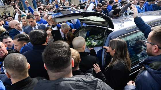 The coffin of former FC Porto president Jorge Nuno Pinto da Costa is carried out of Antas church following his funeral in Porto, Portugal, 17 February 2025. Jorge Nuno Pinto da Costa, former president of FC Porto, where he established himself as the longest-serving manager in world football between 1982 and 2024, died on 15 February at the age of 87. FERNANDO VELUDO/LUSA