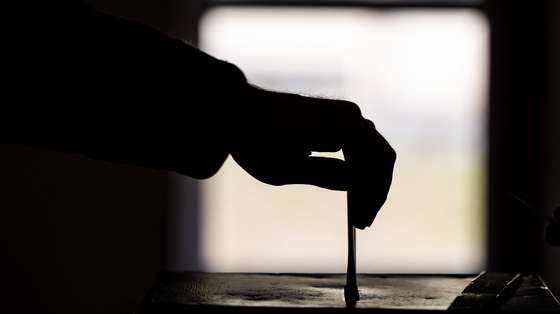 A man casts his ballot for the general elections at a pooling station, in Lisbon, Portugal, 10 March 2024. More than 10.8 million Portuguese are expected to vote to elect 230 deputies to the Portuguese Parliament. Eighteen political forces (15 parties and three coalitions) are running in these elections. JOSE SENA GOULAO/LUSA