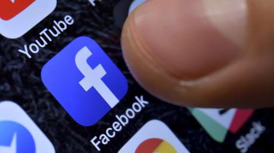 epa08925058 (FILE) - A close-up image showing the Facebook app on an iPhone in Kaarst, Germany, 08 November 2017 (reissued 07 January 2021). Facebook CEO Mark Zuckerberg on 07 January 2021 announced on his platform that the block placed on US President Donald J. Trump's on 06 January 2021 was being extended for his 'Facebook and Instagram accounts indefinitely and for at least the next two weeks until the peaceful transition of power is complete'. The move comes after various groups of President Trump's supporters broke into the US Capitol in Washington, DC and rioted as Congress met to certify the results of the 2020 US Presidential election.  EPA/SASCHA STEINBACH *** Local Caption *** 56109918