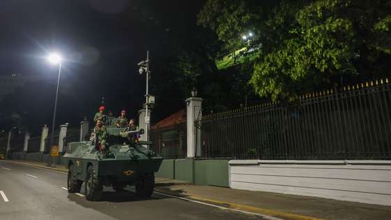 epaselect epa12622498 Military personnel guard the perimeter of the Miraflores Presidential Palace in Caracas, Venezuela, 03 January 2026, after multiple explosions were reported across the capital. US President Trump announced that the United States has 'successfully captured' Venezuelan leader Nicolas Maduro and his wife, who have been flown out of the country following a series of large-scale military strikes on Caracas. The Venezuelan government has denounced the move, accusing Washington of launching a wave of military attacks against civilian and military targets nationwide.  EPA/MIGUEL GUTIERREZ