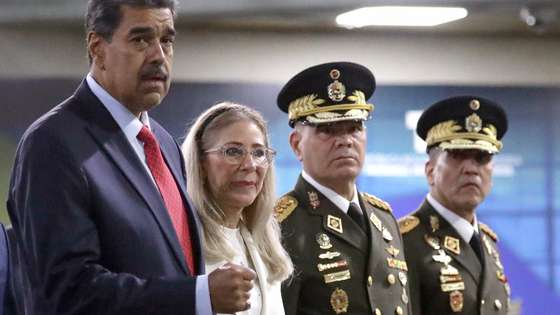 epa12622477 (FILE) - (L-R) Venezuelan President Nicolas Maduro, accompanied by his wife, Celia Flores, and Venezuelan Minister of Defence Vladimir Padrino Lopez, arrives to the Supreme Court of Justice in Caracas, Venezuela, 31 July 2024 (reissued 03 January 2026). US President Trump has announced that the United States has 'successfully captured' Venezuelan leader Nicolas Maduro and his wife following a series of large-scale military strikes on Caracas on 03 January 2026. The Venezuelan government has accused Washington of launching a wave of military attacks against civilian and military targets across the country early 03 January morning.  EPA/RONALD PENA R