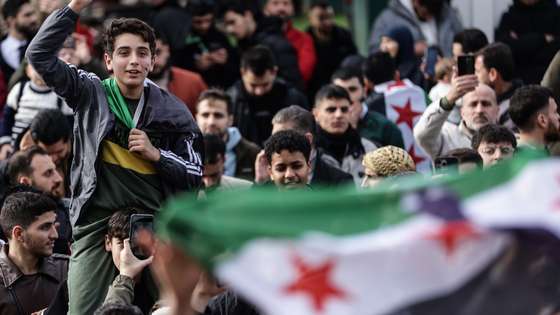 epaselect epa11764179 Supporters of the Syrian opposition residing in Turkey celebrate the rebel take over of Damascus at Fatih Mosque in Istanbul, Turkey, 08 December 2024. Syrian rebels entered Damascus on 08 December 2024 and announced in a televised statement the 'Liberation of the city of Damascus and the overthrow of Bashar al-Assad,' as well as the release of all the prisoners. The rebels also urged the Syrian armed forces to leave Syrian public institutions, which will stay under the control of the outgoing Syrian prime minister until the official handover ceremony.  EPA/ERDEM SAHIN
