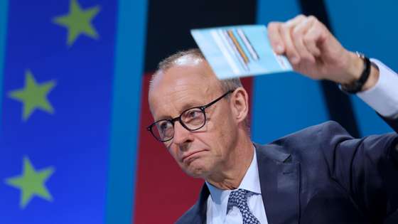 epa12060593 CDU Chairman and faction leader Friedrich Merz votes for the coalition agreement at the meeting of the Federal Committee of the Christian Democratic Union (CDU) in Berlin, Germany, 28 April 2025. The CDU plans to finalize the coalition agreement at a small party convention. Merz is expected to be elected as Chancellor in the Bundestag on 06 May, assuming all goes as planned.  EPA/HANNIBAL HANSCHKE