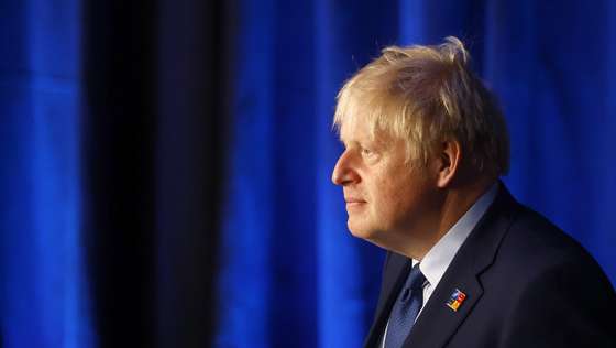 epaselect epa10043072 British Prime Minister Boris Johnson attends the second and last day of the NATO Summit at the IFEMA Convention Center, in Madrid, Spain, 30 June 2022. Heads of State and Government from NATO's member countries and key partners are gathering in Madrid to discuss important issues facing the Alliance and endorse NATO's new Strategic Concept, the Organization said. Spain is hosting the 2022 NATO Summit coinciding with the 40th anniversary of its accession to NATO.  EPA/SERGIO PEREZ