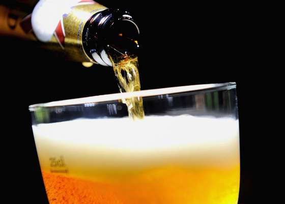 A picture taken on October 1, 2012 shows beer poured from a bottle into a glass of beer in Lille, northern France. The level of taxation of beer will increase in France, which is expected to generate 480 millions of euros to French public welfare system (Securite sociale), the French government announced on October 1, 2012. AFP PHOTO PHILIPPE HUGUEN        (Photo credit should read PHILIPPE HUGUEN/AFP/GettyImages)