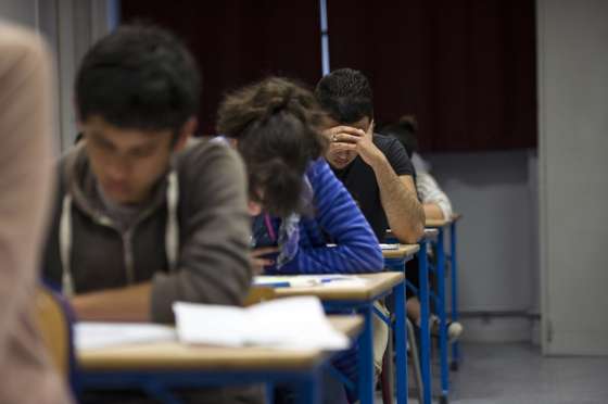 French students work on the test of philosophy as they take the baccalaureat exam (high school graduation exam) on June 17, 2013 at the Arago high school in Paris. Some 664.709 candidates are registered for the 2013 session. The exam results will be announced on July 5, 2013. AFP PHOTO / FRED DUFOUR        (Photo credit should read FRED DUFOUR/AFP/Getty Images)